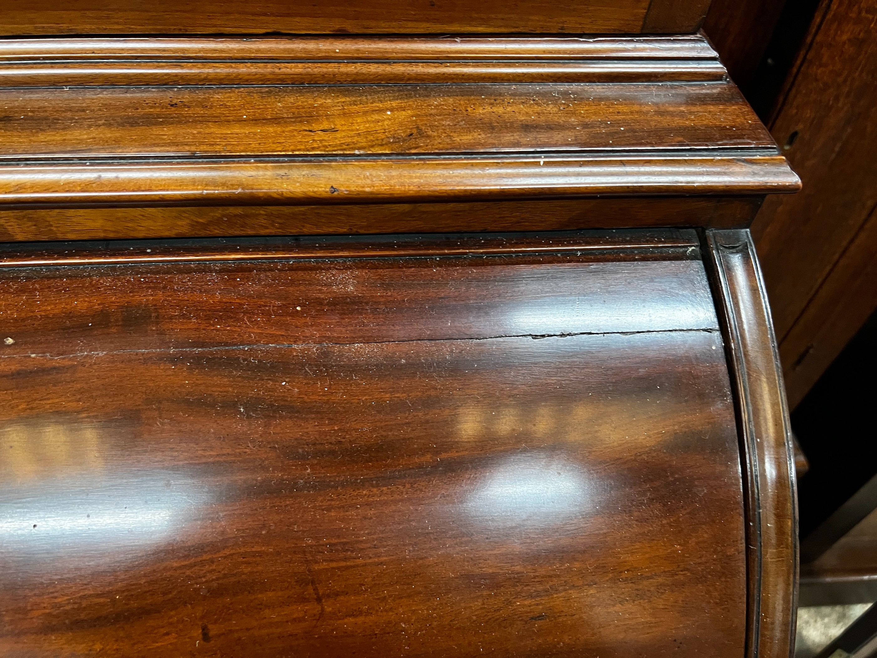 A George III mahogany cylinder bureau bookcase with glazed panelled doors, width 115cm, depth 60cm, height 227cm